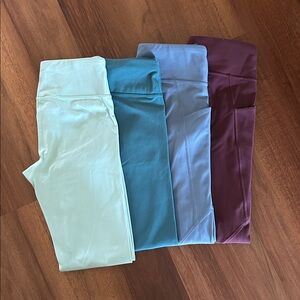 Lot of 4 Athleta Girl Leggings M & L